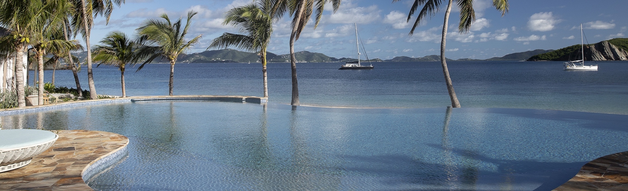 Pool Deck Picture of Lodge Pool overlooking Deadman's Bay hero image